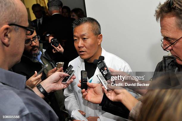 Trauma director Dr. Peter Rhee at University Medical Center speaks with reporters about the improved condition of the shooting victims on January 12,...