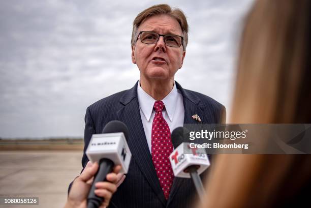 Dan Patrick, governor of Texas, speaks to members of the media at McAllen-Miller International Airport in McAllen, Texas, U.S., on Thursday, Jan. 10,...