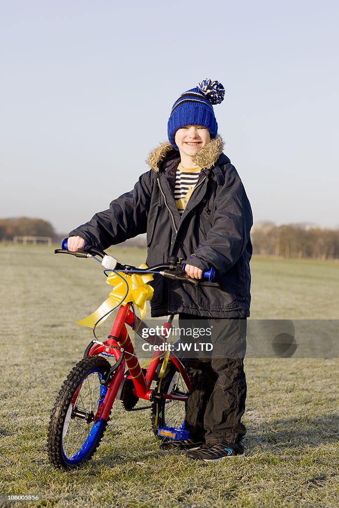 Boy with new bicycle