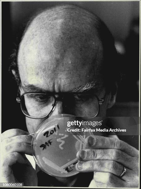 Assoc Prof. John Redmond of Macquarie uni with some mutant Rhizobium, a bug which enters legume roots and causes nitrogen fixation. July 30, 1987. .