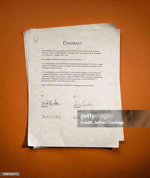 signed contract - contract stock pictures, royalty-free photos & images