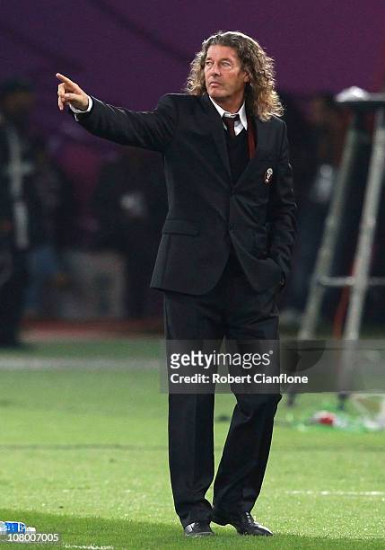 Qatari coach Bruno Metsu gestures during the AFC Asian Cup Group A match between China P.R and Qatar at Khalifa Stadium on January 12, 2011 in Doha,...