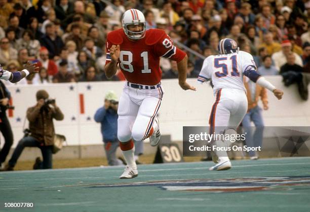 Russ Francis of the New England Patriots in action against the Denver Broncos during an NFL football game at Foxboro Stadium November 28, 1976 in...