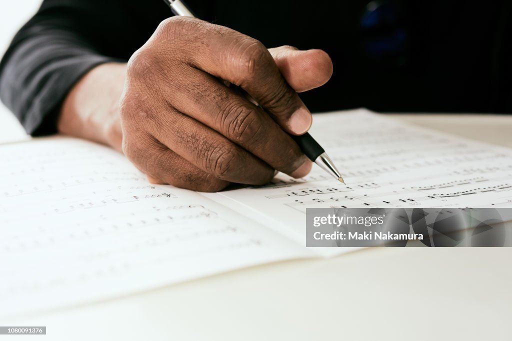 Skilled black musician wrote a song made to the paper