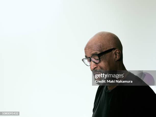 attractive senior black man portrait - black male profile stockfoto's en -beelden