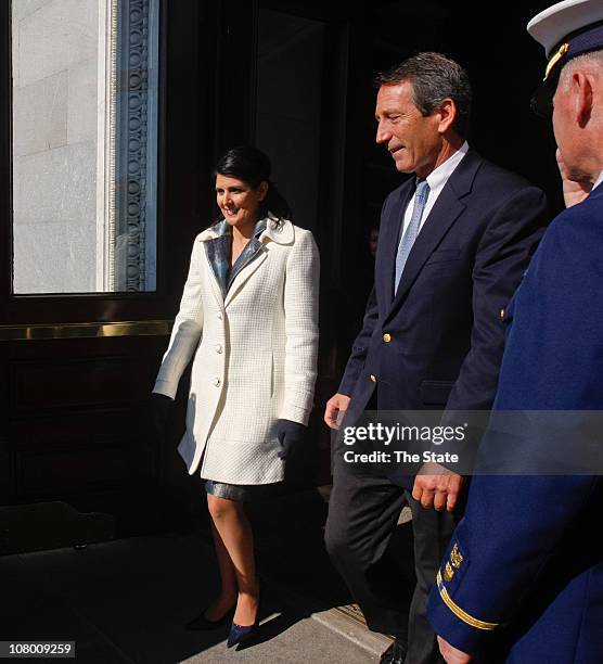 Nikki Haley, left, and Gov. Mark Sanford prepare to proceed down the Statehouse steps for her inauguration ceremony as governor of South Carolina,...