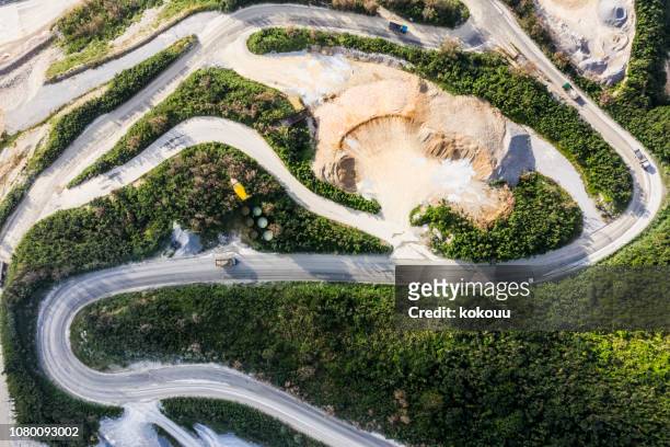aerial shooting at the construction site. - mining natural resources stock pictures, royalty-free photos & images