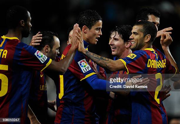 Ibrahim Afellay of FC Barcelona celebrates with his teammates after Seydou Keita scored the fourth goal during the Copa del Rey quarter final first...