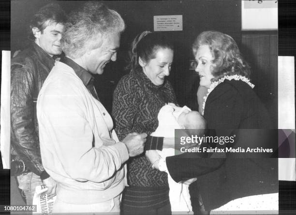 Dame Joan Sutherland, returned from the U.S.A. Today, and was met by her Granddaughter, Natasha, 4weeks old daughter of Adam Bonynge and his wife...