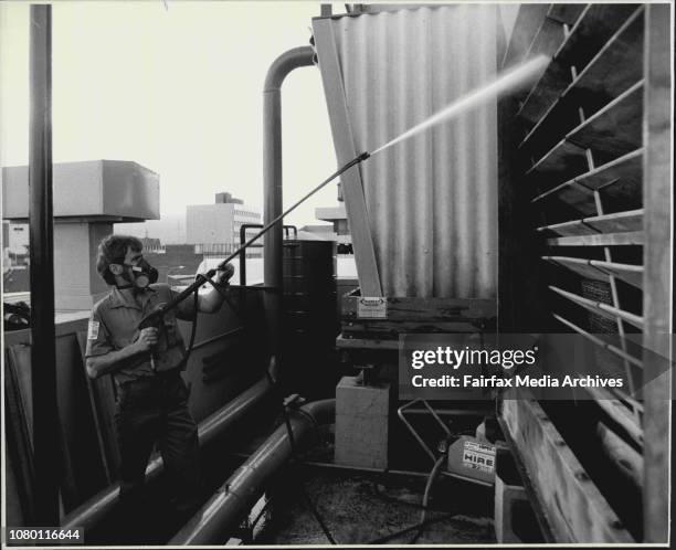 Legionnaires Disease at Wollongong.Mark Sharp servicing the carrier air conditioning tower. May 14, 1987. .