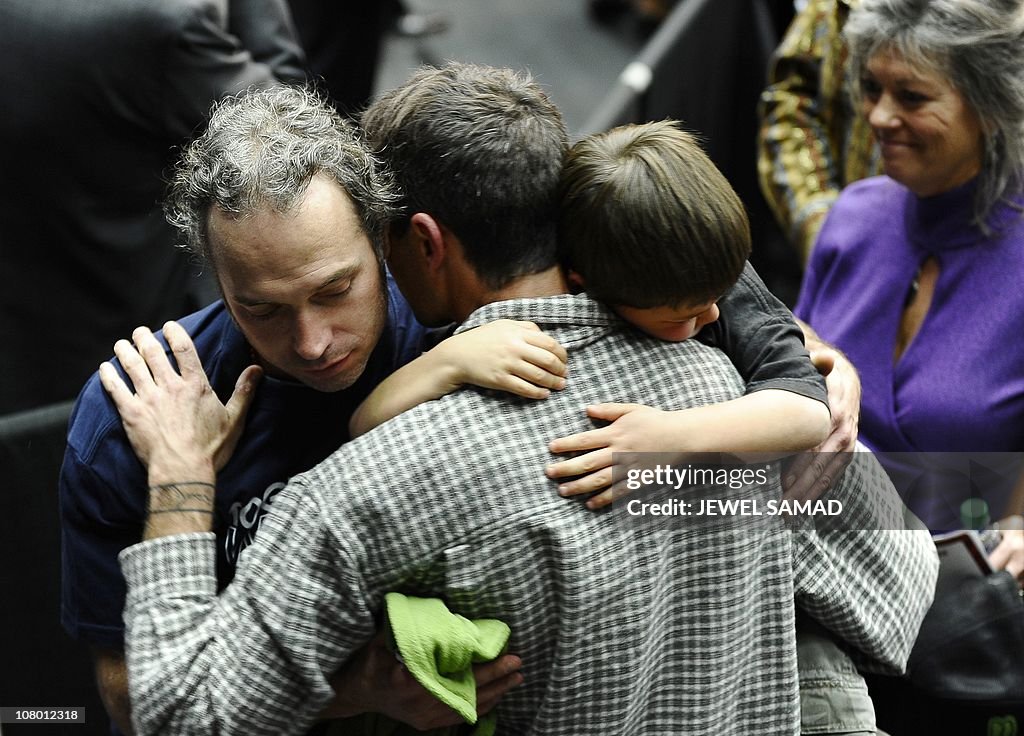 A man mourns as US President Barack Obam