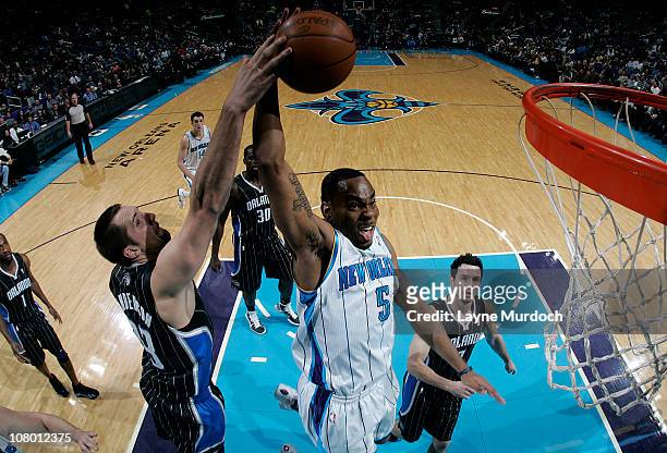 Marcus Thornton of the New Orleans Hornets goes up for a dunk against the Orlando Magic on January 12, 2011 at the New Orleans Arena in New Orleans,...