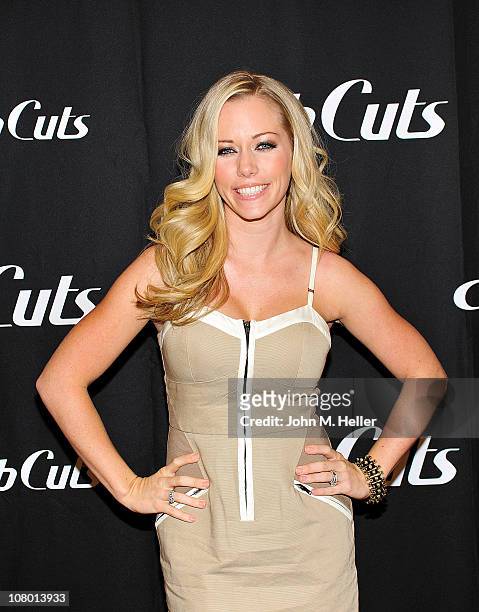 Former Playmate of the Year Kendra Wilkenson signs pictures and promotes Ab Cuts a body supplement by Revolution at GNC in the Westfield Mall on...