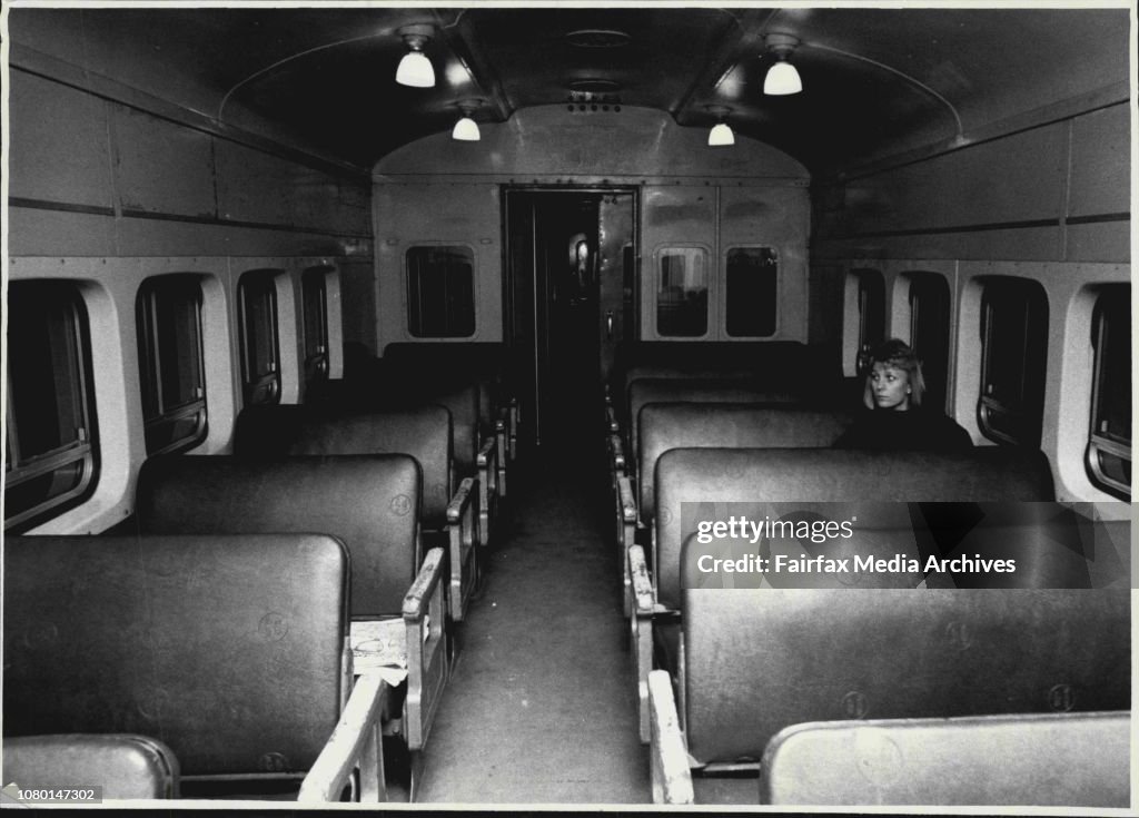 Miss Astrida Mezaks, 28, of Yagoona travelling on her own in one of the Carriages of the train.Train passengers travelling at night on the Bankstown line.