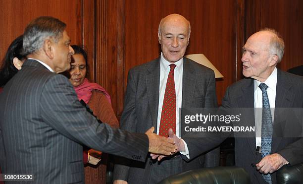 Indian Foreign Minister S.M. Krishna shakes hands with Brent Scowcroft former United States National Security Advisor under former US Presidents...