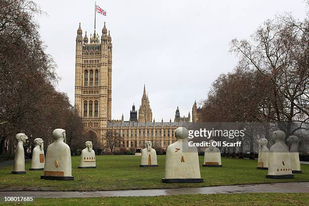 Series of sculptures entitled 'Nuestros Silencios' by Mexican artist Rivelino are installed in Victoria Tower Gardens on January 13, 2011 in London,...
