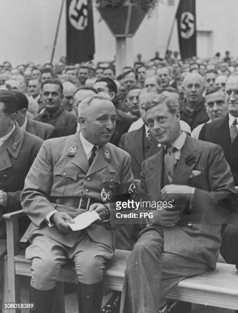 The Duke of Windsor visits a stock factory in Berlin, 11th October 1937. On the left is Dr Robert Ley , head of the German Labour Front.