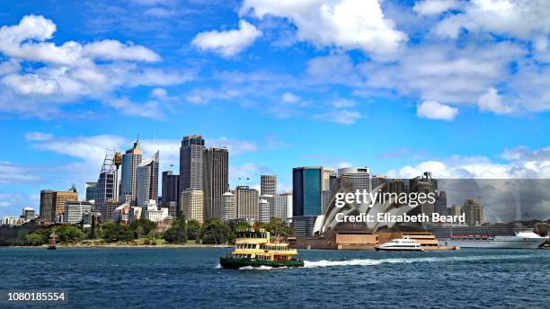 sydney harbor ferry with skyline and opera house - sydney ferry stock-fotos und bilder