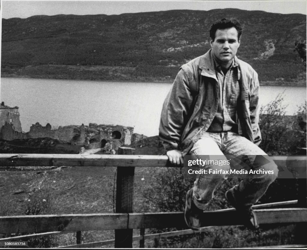 Australian Survivors of Air crash in Peru -- Anthony Stubley (sitting on fence).