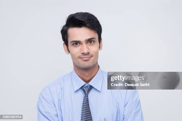 indian sales man facial expression - stock images - salesman stock pictures, royalty-free photos & images