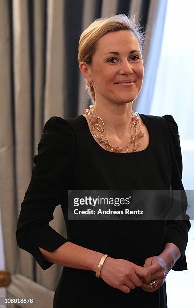 German First Lady Bettina Wulff smiles during the New Year's reception at Bellevue Palace on January 13, 2011 in Berlin, Germany. German President...