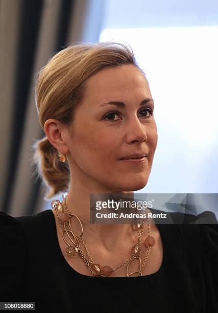 German First Lady Bettina Wulff gestures during the New Year's reception at Bellevue Palace on January 13, 2011 in Berlin, Germany. German President...