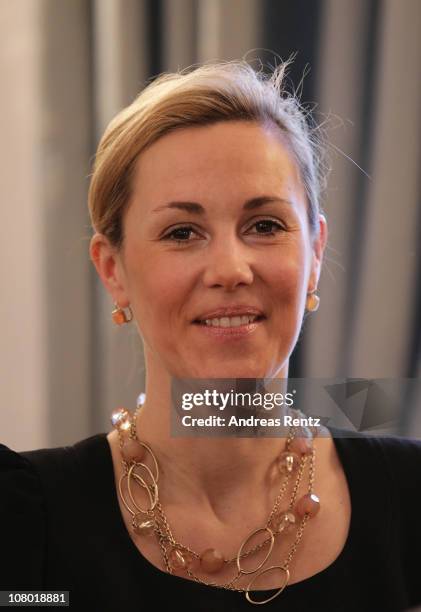 German First Lady Bettina Wulff gestures during the New Year's reception at Bellevue Palace on January 13, 2011 in Berlin, Germany. German President...