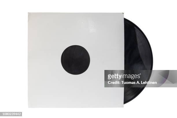 12-inch 33 1/3 rpm lp vinyl record in a old white paper case. isolated on white background. - coprire foto e immagini stock
