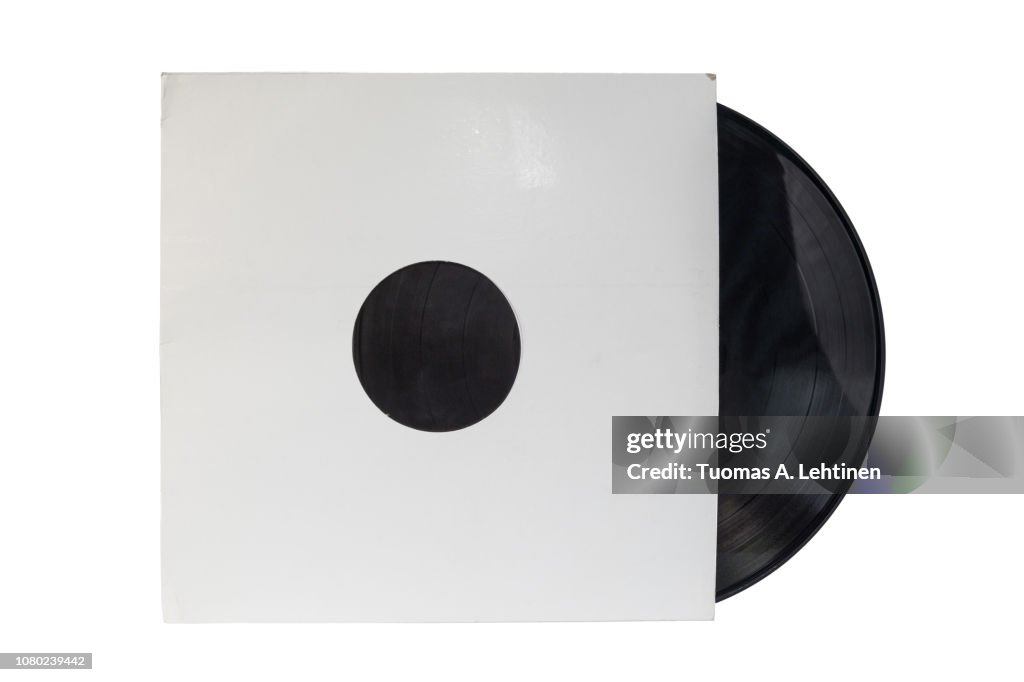 12-inch 33 1/3 rpm LP vinyl record in a old white paper case. Isolated on white background.