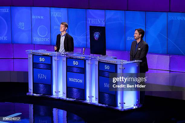 Contestants Ken Jennings and Brad Rutter compete against 'Watson' at a press conference to discuss the upcoming Man V. Machine "Jeopardy!"...