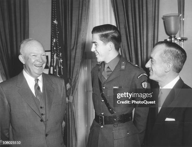 President Dwight Eisenhower shares a laugh with the Crown Prince of Greece and Greek Ambassador to the US Alexis S. Liatis at the White House,...