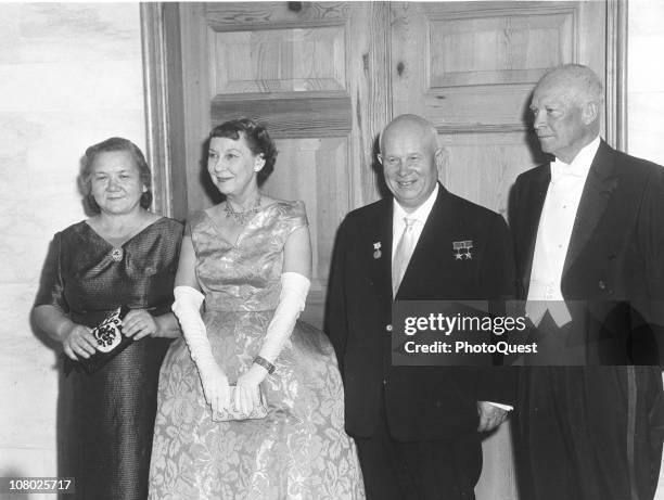 Soviet leader Nikita Khrushchev and his wife, Nina Khrushcheva poase with US President Dwight Eisenhower and his wife, First Lady Mamie Eisenhower...