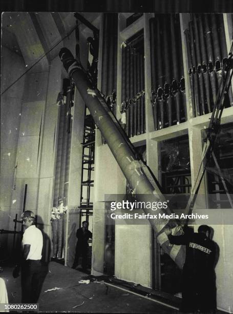 At the Opera House today the largest organ pipe weighting 950lb was lifted into place with the other pipes.The pipe in lifted into place it was...