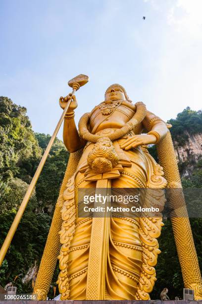 lord murugan statue, kuala lumpur, malaysia - batu caves stock pictures, royalty-free photos & images