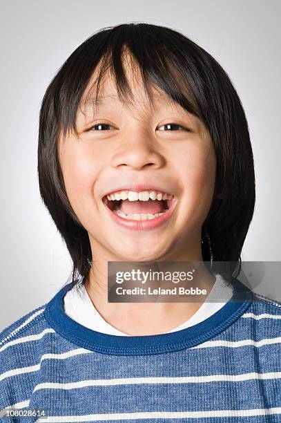 portrait of ecstatic boy 9-11 years - 8 9 years stock-fotos und bilder