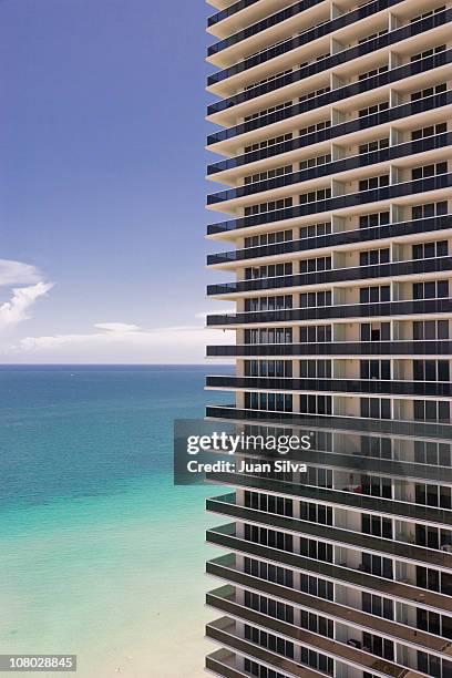 apartment buildings in front of ocean - hallandale beach stock pictures, royalty-free photos & images