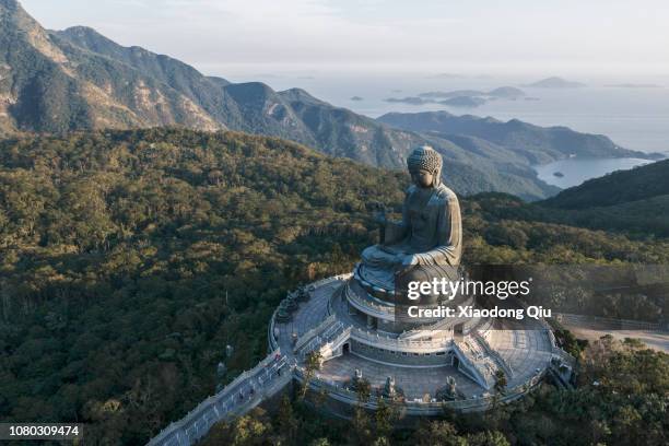 aerial view of hong kong tian tan buddha at dusk - lantau imagens e fotografias de stock