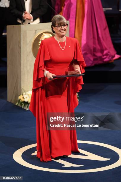 Donna Strickland, laureate of the Nobel Prize in Physics acknowledges applause after she received her Nobel Prize from King Carl XVI Gustaf of Sweden...