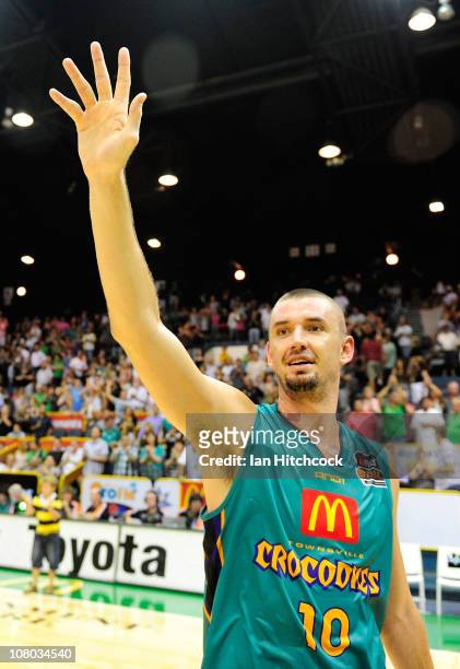 Russell Hinder of the Crocodiles waves to the crowd after winning the round 14 NBL match between the Townsville Crocodiles and the Melbourne Tigers...