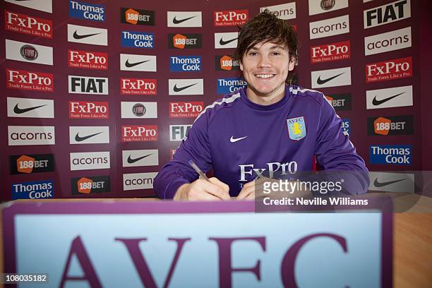Chris Herd of Aston Villa signs a new contract at the Aston Villa Training Ground at Bodymoor Heath on January 14, 2011 in Birmingham, England.