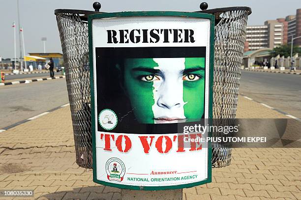 Poster reading 'Register to vote' is displayed aiming at encouraging the population to take part in the forthcoming voter's registration in Abuja on...
