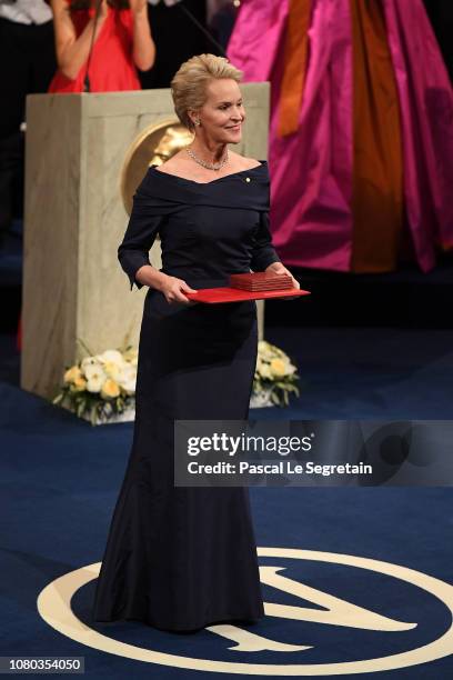 Frances H. Arnold, laureate of the Nobel Prize in Chemistry acknowledges applause after she received her Nobel Prize from King Carl XVI Gustaf of...