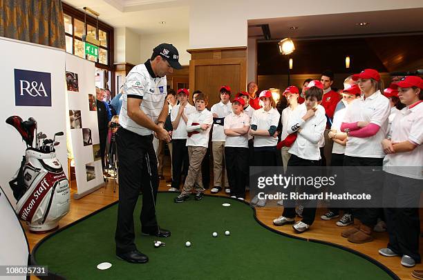 Two time Open Championship winner Padraig Harrington of Ireland gives a golf clinic to junior golfers after he is announced as the first Working for...