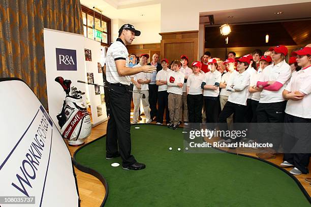 Two time Open Championship winner Padraig Harrington of Ireland gives a golf clinic to junior golfers after he is announced as the first Working for...