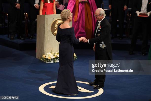 Frances H. Arnold, laureate of the Nobel Prize in Chemistry receives her Nobel Prize from King Carl XVI Gustaf of Sweden during the Nobel Prize...