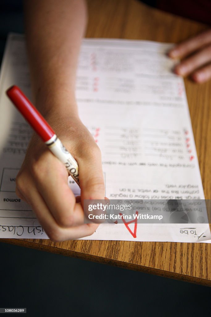 Teacher Grading Classwork High-Res Stock Photo - Getty Images