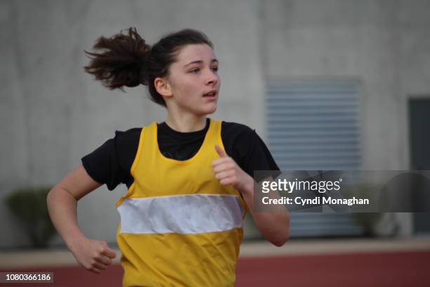 Girl Running Track and Field