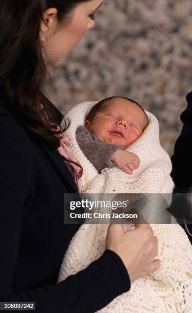 Princess Mary of Denmark holds a new-born baby twin as they leave the Rigshospitalet on January 14, 2011 in Copenhagen, Denmark. Princess Mary of...