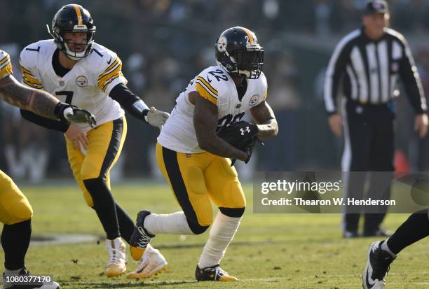 Stevan Ridley of the Pittsburgh Steelers carries the ball against the Oakland Raiders during the first half of their NFL football game at...