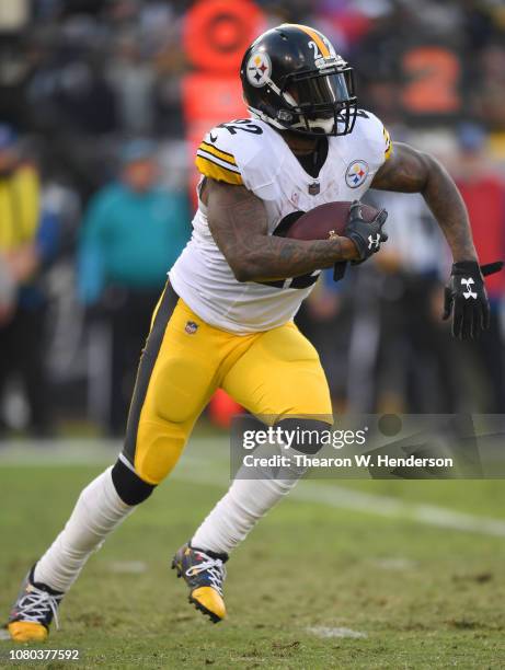 Stevan Ridley of the Pittsburgh Steelers carries the ball against the Oakland Raiders during the second half of an NFL football game at...